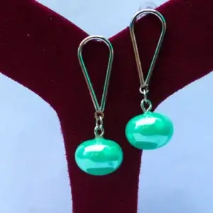 stylish droplet design earrings green colour